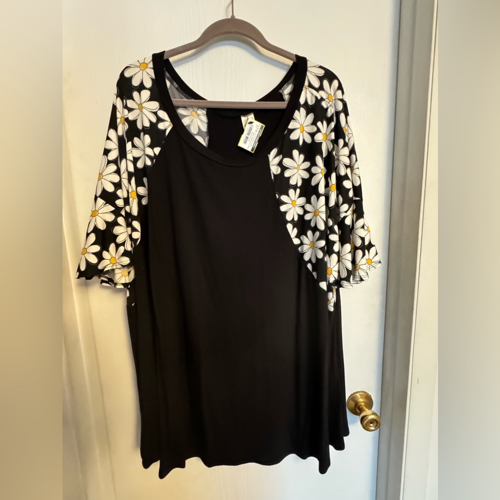 Plus size.  Flutter sleeve top.